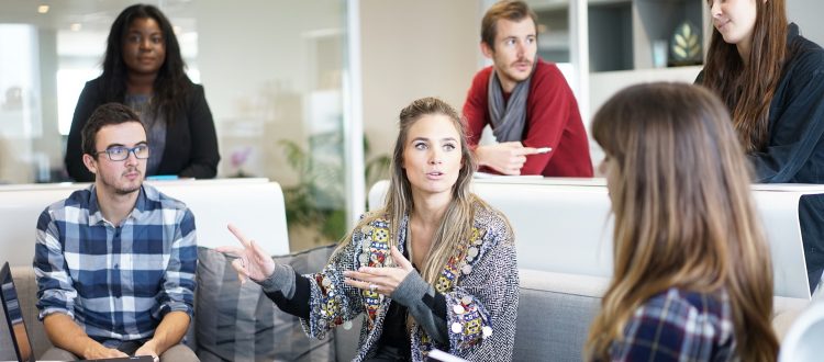 woman leads a group discussion